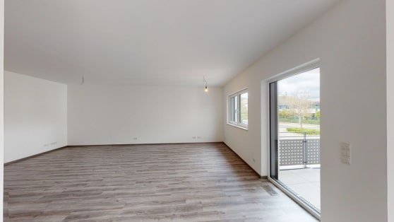 Angeboten wird diese neuwertige Eigentumswohnung in zeitgemer Architektur