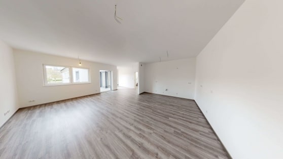 Angeboten wird diese neuwertige Eigentumswohnung in zeitgemer Architektur