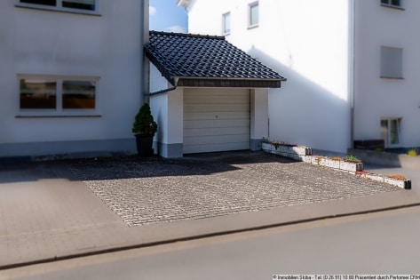 Ebenerdige Eigentumswohnung mit Garten und Garage in zentrumsnaher Lage von Adenau