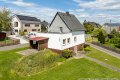 Einfamilienhaus mit groer Wiese und Doppelgarage in Wershofen