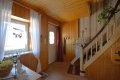 Einseitig angebautes Wohnhaus mit Garten und Garage