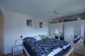 Einseitig angebautes Wohnhaus mit Scheune und Garage