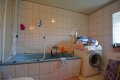 Einseitig angebautes Wohnhaus mit Scheune und Garage