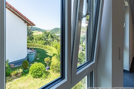 Erstbezug: Moderne Neubau-Erdgeschoss-Eigentumswohnung mit 2 Garagen in Daun-Ptzborn