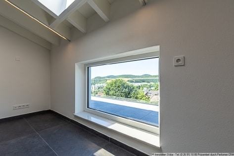 Erstbezug: Moderne Neubau-Erdgeschoss-Eigentumswohnung mit 2 Garagen in Daun-Ptzborn