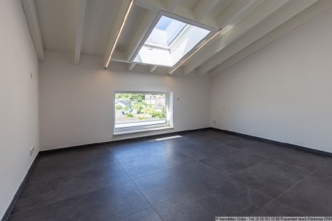 Erstbezug: Moderne Neubau-Erdgeschoss-Eigentumswohnung mit 2 Garagen in Daun-Ptzborn