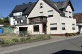 Gepflegtes Einfamilienwohnhaus mit Anbau (Hobbyraum und PKW-Garage) in Langenfeld