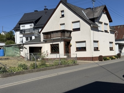 Gepflegtes Einfamilienwohnhaus mit Anbau (Hobbyraum und PKW-Garage) in Langenfeld
