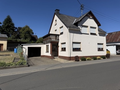 Gepflegtes Einfamilienwohnhaus mit Anbau (Hobbyraum und PKW-Garage) in Langenfeld