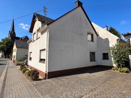 Gepflegtes Einfamilienwohnhaus mit Anbau (Hobbyraum und PKW-Garage) in Langenfeld
