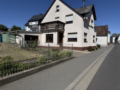 Gepflegtes Einfamilienwohnhaus mit Anbau (Hobbyraum und PKW-Garage) in Langenfeld