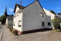 Gepflegtes Einfamilienwohnhaus mit Anbau (Hobbyraum und PKW-Garage) in Langenfeld