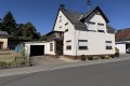 Gepflegtes Einfamilienwohnhaus mit Anbau (Hobbyraum und PKW-Garage) in Langenfeld