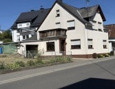 Gepflegtes Einfamilienwohnhaus mit Anbau (Hobbyraum und PKW-Garage) in Langenfeld