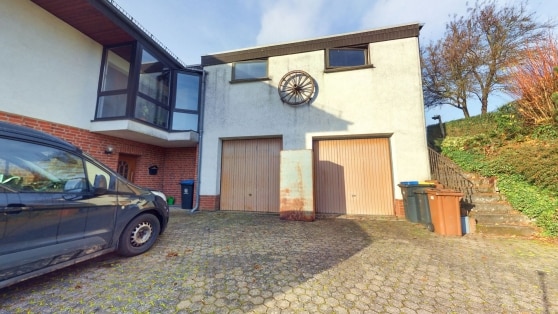 Gepflegtes Einfamilienwohnhaus mit Einliegerwohnung in Randlage