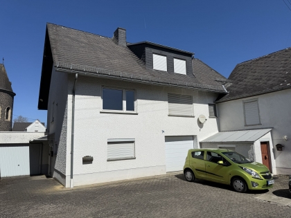 Gepflegtes Einfamilienwohnhaus mit einem angrenzenden Altbau in ruhiger Wohnlage