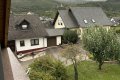 Grozgiges Einfamilienwohnhaus mit vermieteter Einliegerwohnung in toller Aussichtslage