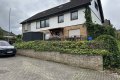 Grozgiges Einfamilienwohnhaus mit vermieteter Einliegerwohnung in toller Aussichtslage