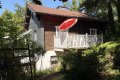 Pferdeliebhaber aufgepasst! Idyllisches Anwesen mit Holzblockhaus, Stallungen, Paddock & Weideland