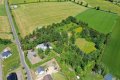 Pferdeliebhaber aufgepasst! Idyllisches Anwesen mit Holzblockhaus, Stallungen, Paddock & Weideland