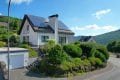 RESERVIERT Ruhig gelegenes, freistehendes Haus mit Garten, Terrasse, PV-Anlage, Garage und Aussicht