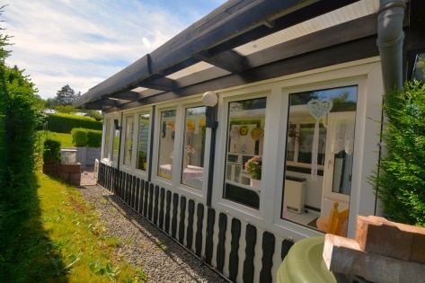 RESERVIERT Wunderschner Ferienbungalow mit Wintergarten, Carport und Gartenhaus