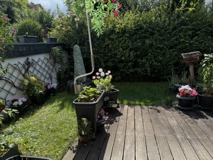 Raumwunder mit Garten, Balkon, Garage und Keller f�r die junge Familie