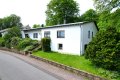 Ruhig gelegener, gerumiger Bungalow mit Garten und 2 Garagen am Ortsrand