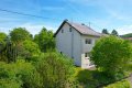 Ruhig gelegenes Einfamilienhaus mit Terrasse, Garagen und Garten