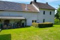 Ruhig gelegenes Einfamilienhaus mit Terrasse, Garagen und Garten