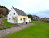 Ruhig gelegenes, freistehendes Einfamilienhaus mit Garage, Garten und herrlicher Aussicht