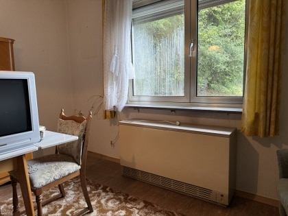 Sanierungsbedrftiges Einfamilienwohnhaus in ruhiger Wohnlage der Gemeinde Mllenbach (Kreis Cochem-Zell)