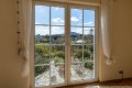Tolle Aussicht in ruhiger Lage mit stilvoll angelegtem Garten - junges, energieeffizientes Wohnhaus