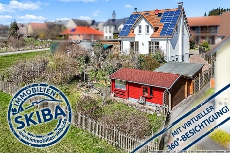 Tolle Aussicht in ruhiger Lage mit stilvoll angelegtem Garten - junges, energieeffizientes Wohnhaus