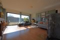   Wunderschn gelegener Bungalow mit Einliegerwohnung, Terrasse, Balkon, Garten, Garage, PV-Anlage und einmaligem Ausblick