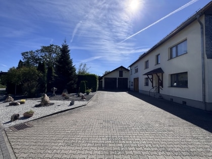 Zweifamilienhaus mit herrlichem Garten, gro�er Garage und viel Platz in Dommershausen-Dorweiler!