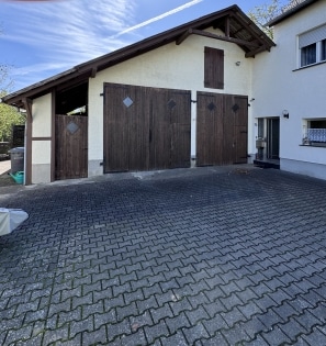 Zweifamilienhaus mit herrlichem Garten, gro�er Garage und viel Platz in Dommershausen-Dorweiler!